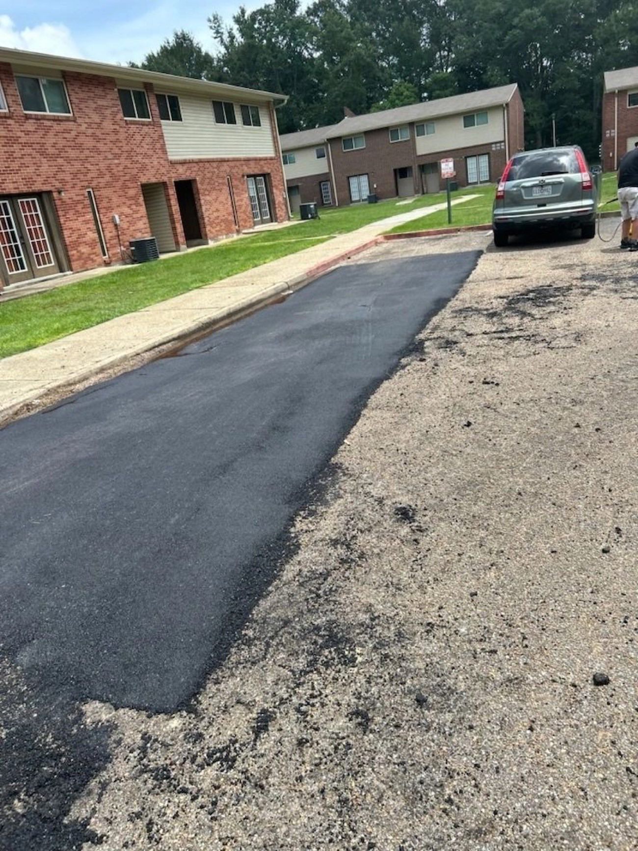 Fresh asphalt road paved by Gulfline Paving